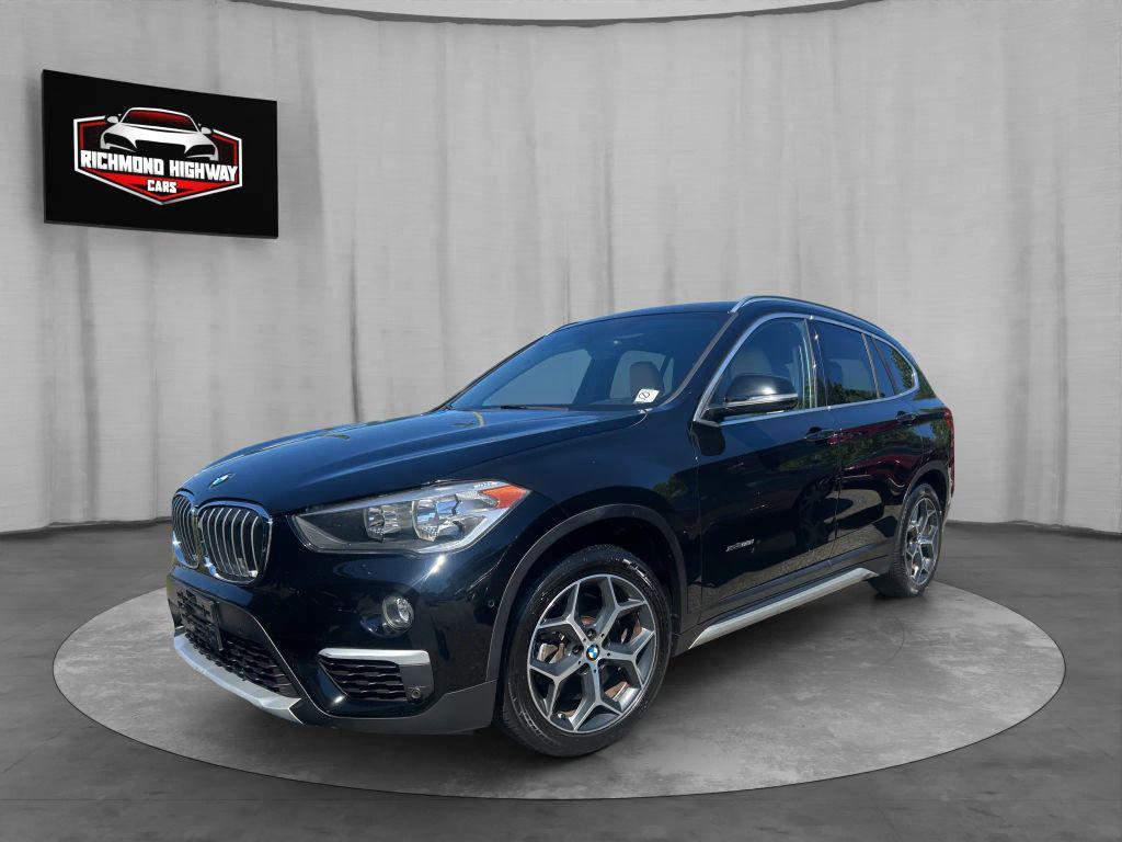 used 2018 BMW X1 car, priced at $11,000