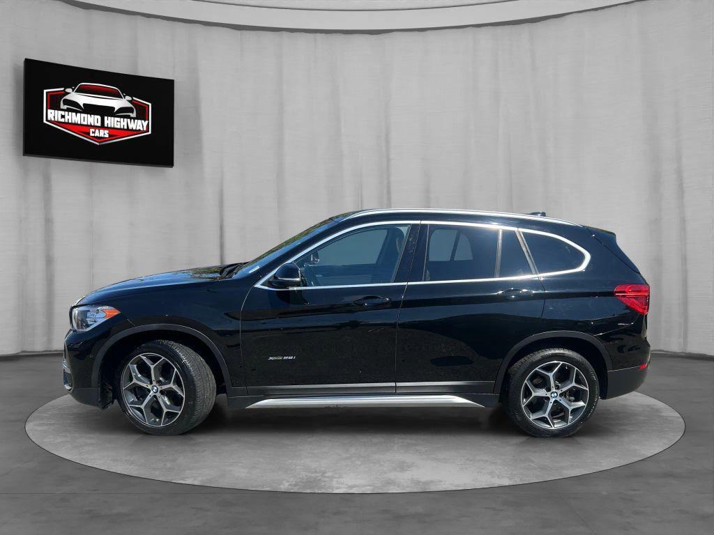 used 2018 BMW X1 car, priced at $11,000