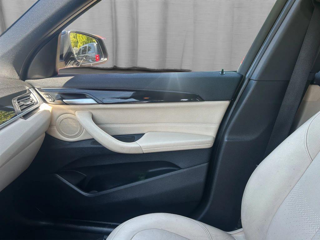 used 2018 BMW X1 car, priced at $11,000
