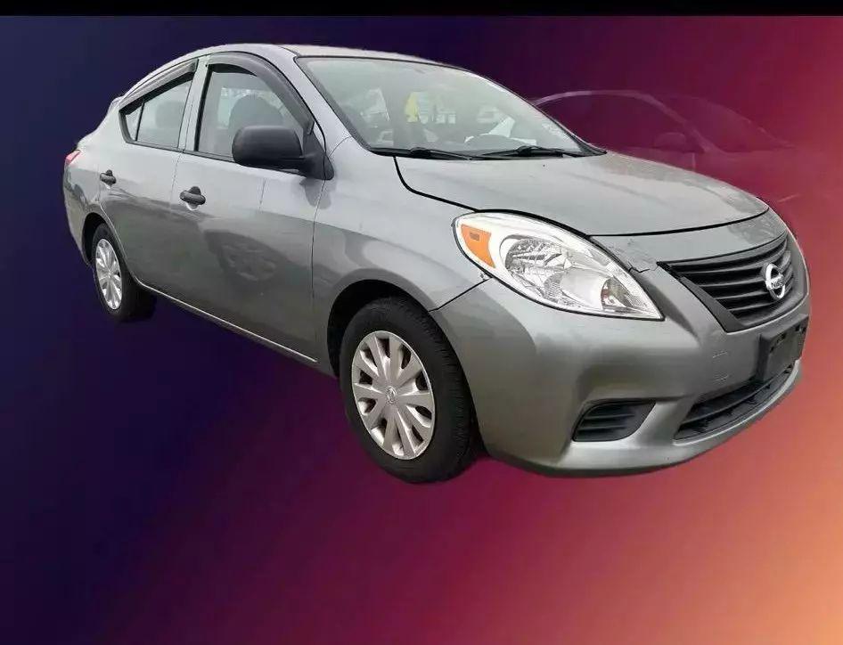 used 2012 Nissan Versa car, priced at $3,200
