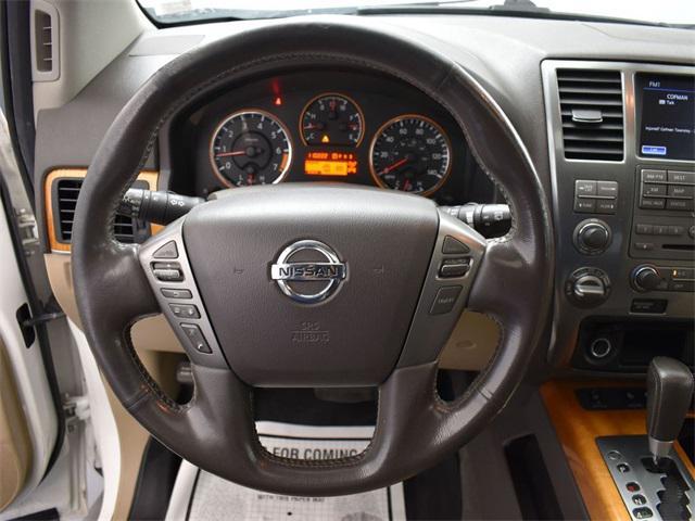 used 2013 Nissan Armada car, priced at $15,000