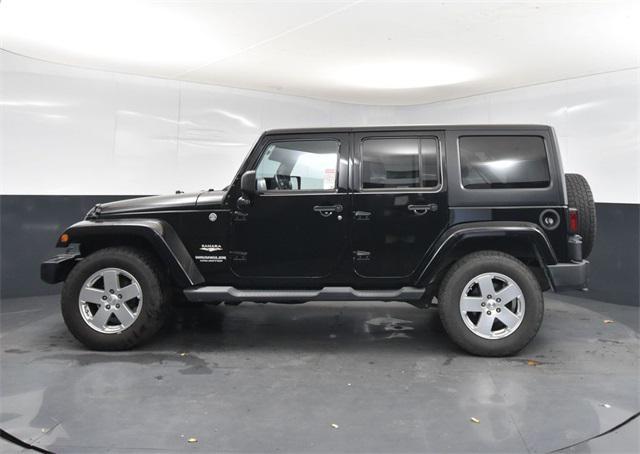 used 2011 Jeep Wrangler Unlimited car, priced at $15,000