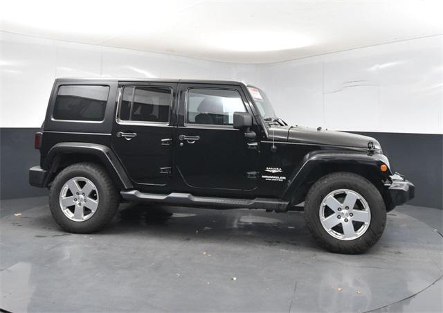 used 2011 Jeep Wrangler Unlimited car, priced at $15,000