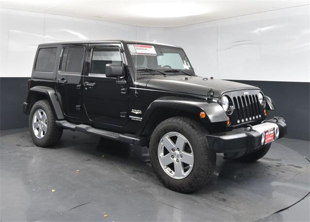 used 2011 Jeep Wrangler Unlimited car, priced at $15,000