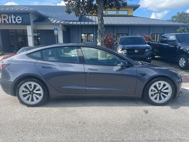 used 2023 Tesla Model 3 car, priced at $25,980