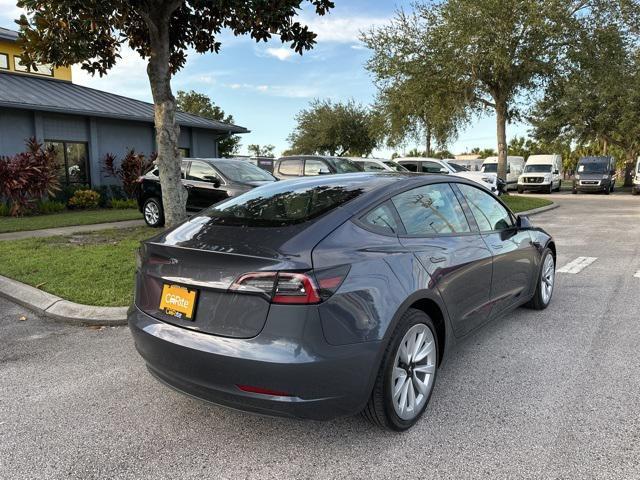 used 2023 Tesla Model 3 car, priced at $27,616