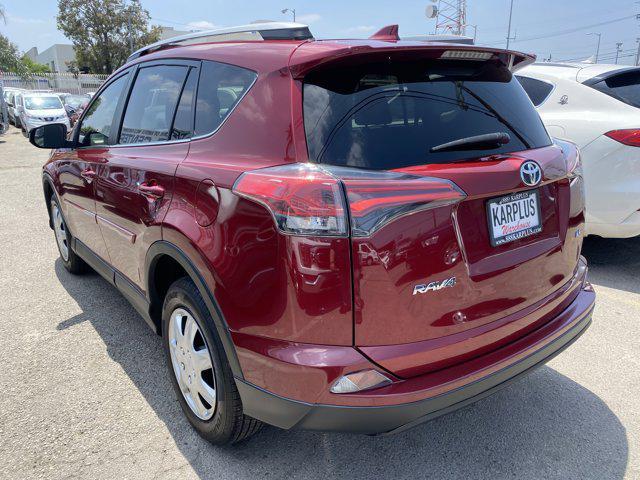 used 2018 Toyota RAV4 car, priced at $15,233