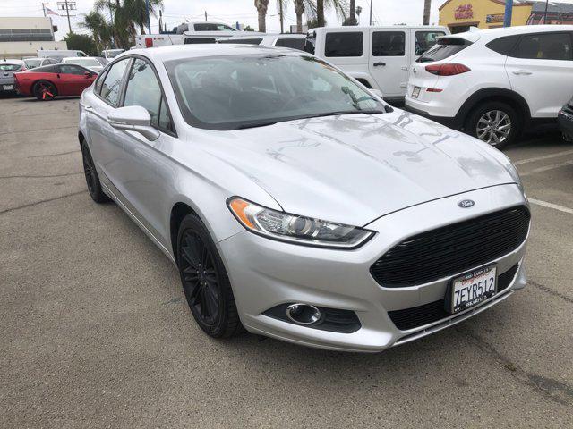 used 2014 Ford Fusion car, priced at $6,977