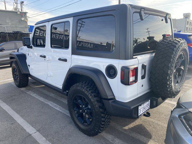 used 2021 Jeep Wrangler Unlimited car, priced at $23,977