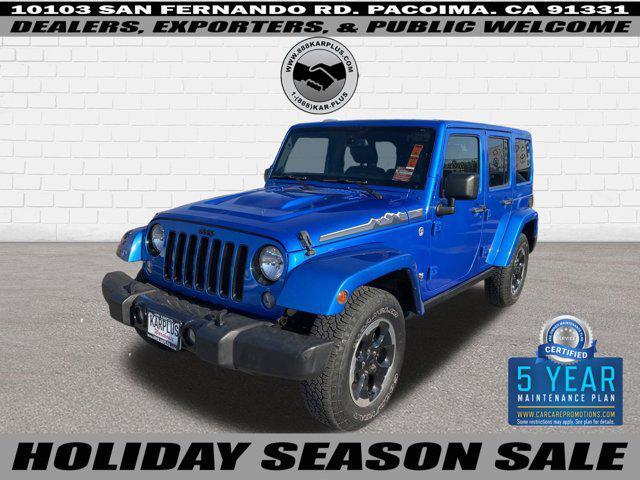 used 2014 Jeep Wrangler Unlimited car, priced at $18,297