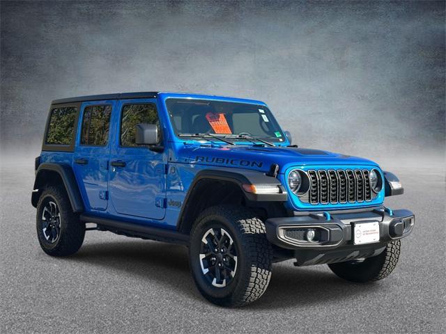 used 2024 Jeep Wrangler 4xe car, priced at $33,120