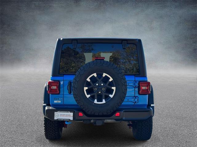 used 2024 Jeep Wrangler 4xe car, priced at $33,120