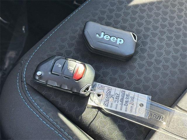 used 2024 Jeep Wrangler 4xe car, priced at $33,120