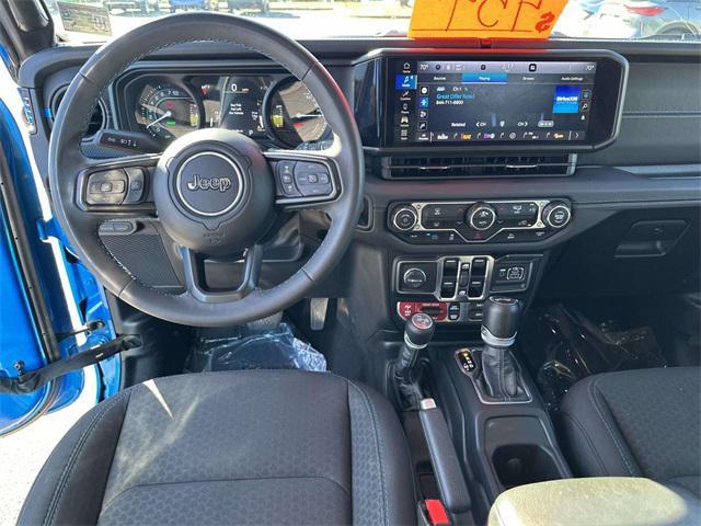 used 2024 Jeep Wrangler 4xe car, priced at $33,120