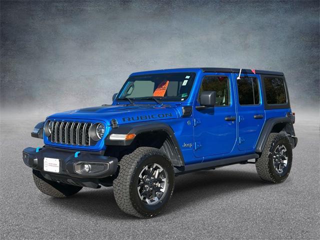 used 2024 Jeep Wrangler 4xe car, priced at $33,120
