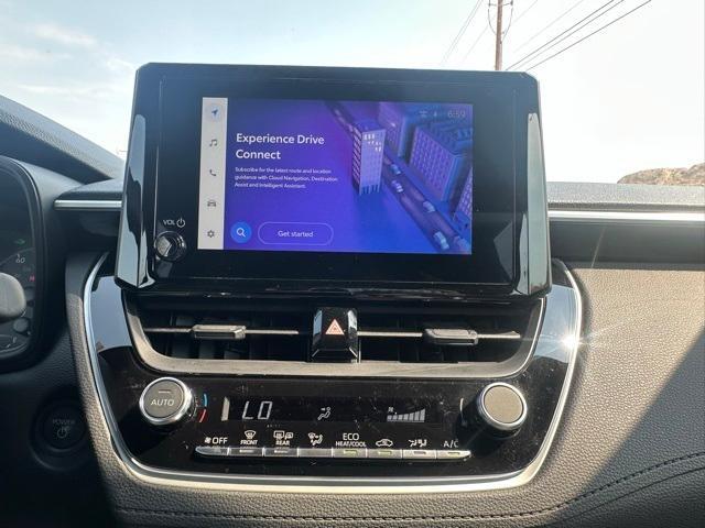 used 2024 Toyota Corolla Cross Hybrid car, priced at $28,620