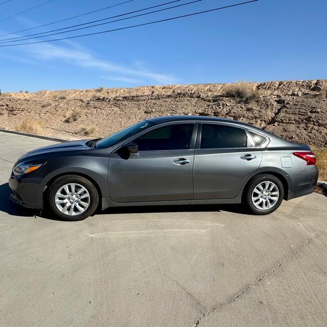 used 2016 Nissan Altima car, priced at $13,000