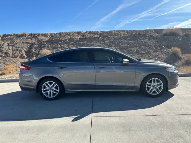 used 2014 Ford Fusion car, priced at $9,400