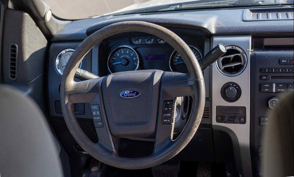 used 2014 Ford F-150 car, priced at $8,999