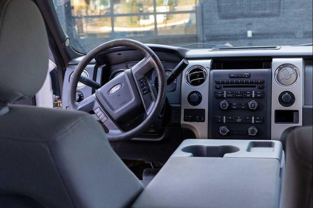 used 2014 Ford F-150 car, priced at $8,999