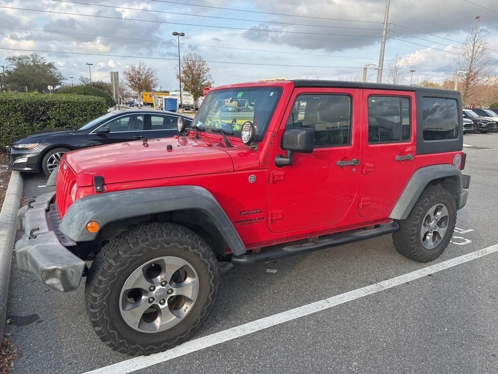 used 2015 Jeep Wrangler Unlimited car, priced at $18,779