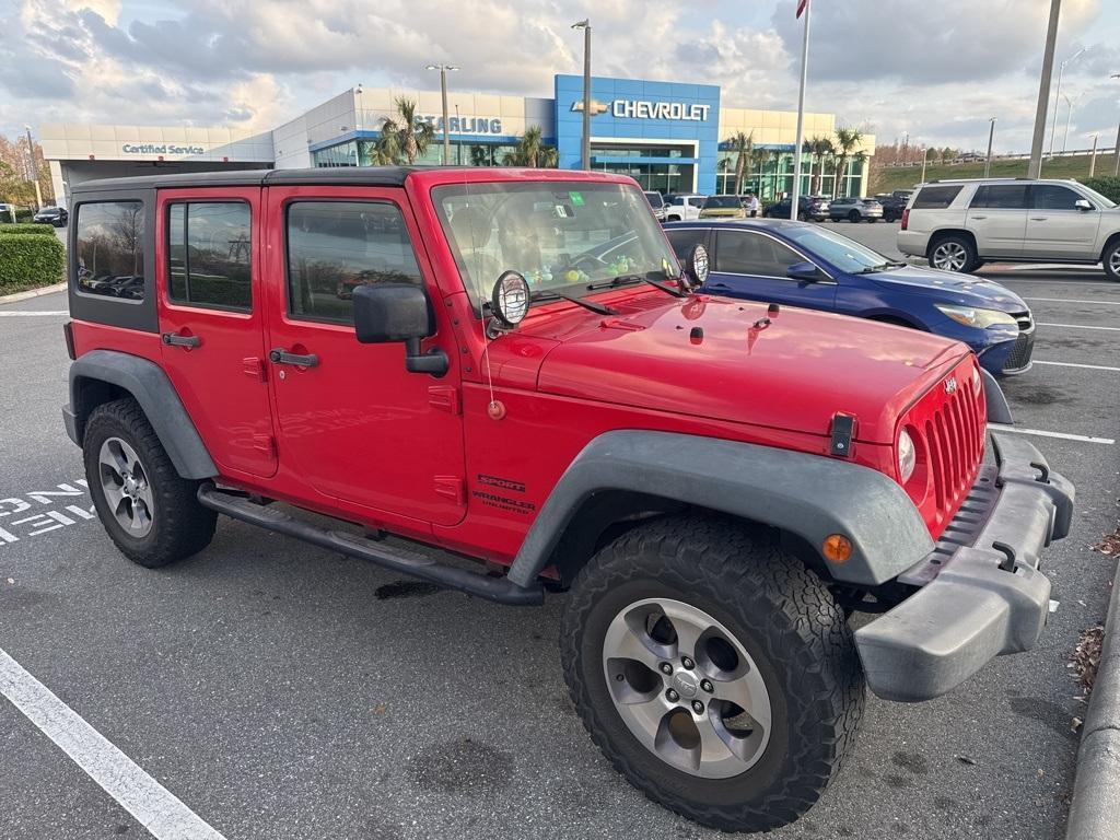 used 2015 Jeep Wrangler Unlimited car, priced at $18,779