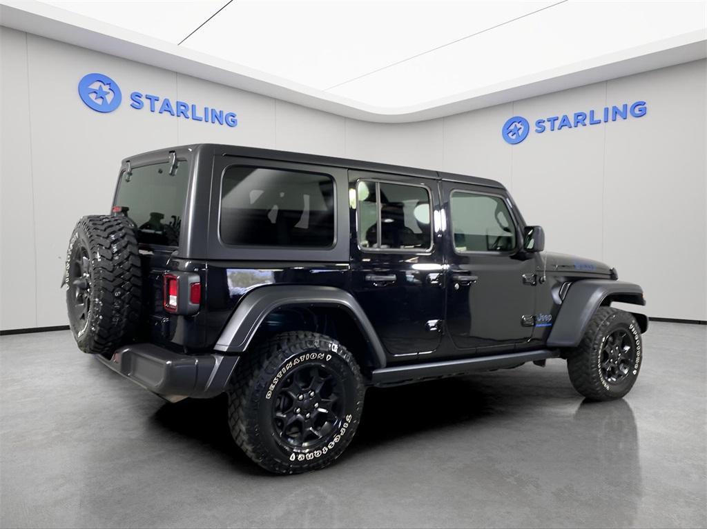 used 2023 Jeep Wrangler 4xe car, priced at $30,890