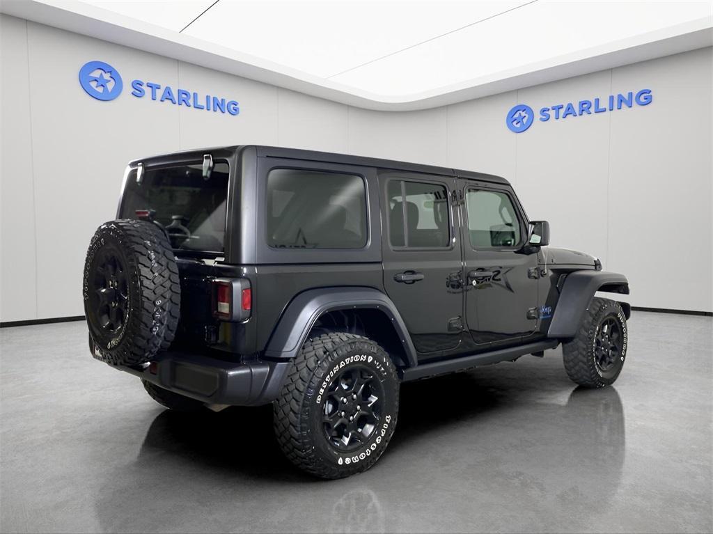 used 2023 Jeep Wrangler 4xe car, priced at $30,890