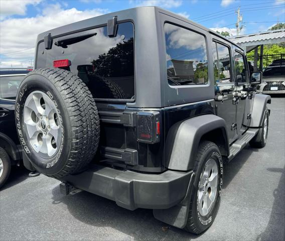 used 2013 Jeep Wrangler Unlimited car, priced at $16,995