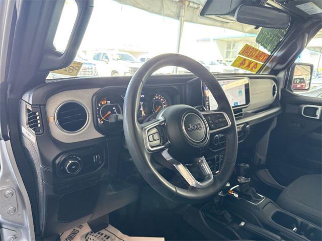 used 2024 Jeep Wrangler car, priced at $38,369