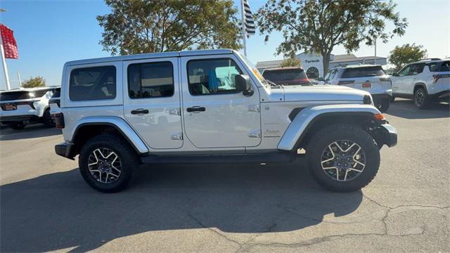 used 2024 Jeep Wrangler car, priced at $38,369