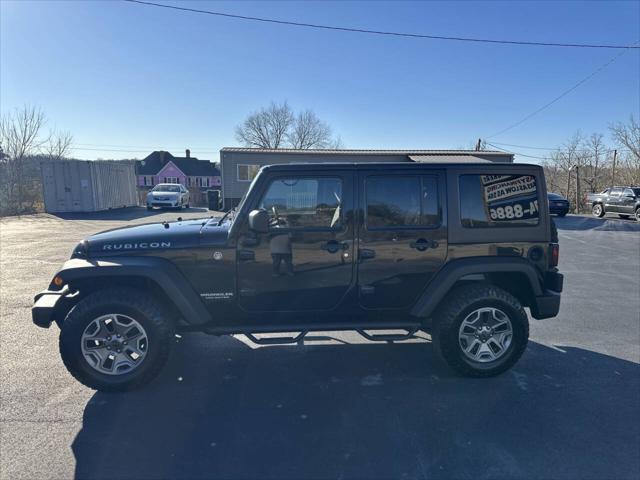 used 2013 Jeep Wrangler Unlimited car, priced at $16,400