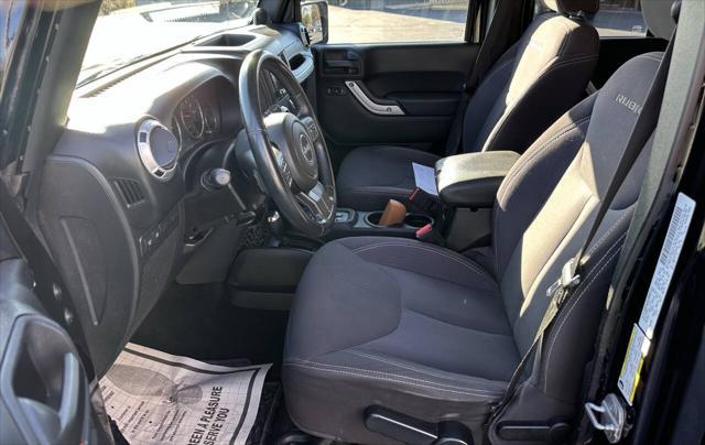 used 2013 Jeep Wrangler Unlimited car, priced at $16,400