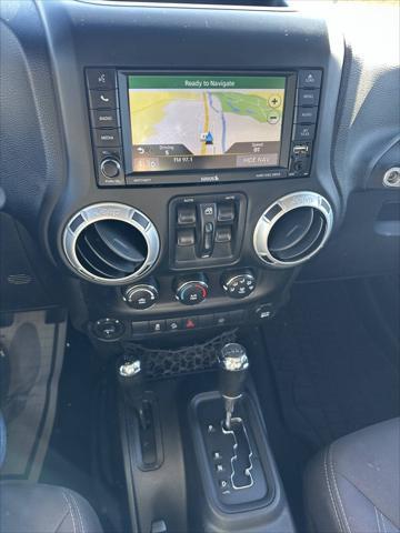used 2013 Jeep Wrangler Unlimited car, priced at $16,400