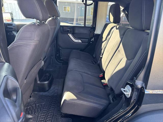 used 2013 Jeep Wrangler Unlimited car, priced at $16,400