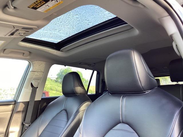 used 2021 Toyota Highlander Hybrid car, priced at $36,990