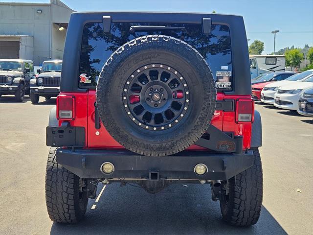 used 2018 Jeep Wrangler JK Unlimited car, priced at $26,993