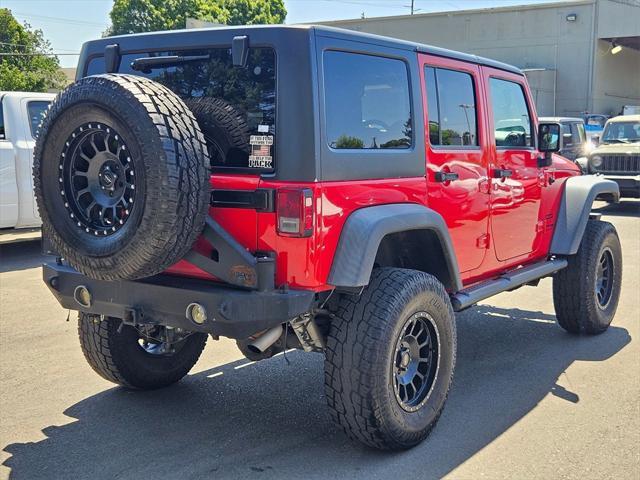used 2018 Jeep Wrangler JK Unlimited car, priced at $26,993