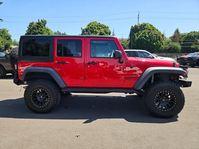 used 2018 Jeep Wrangler JK Unlimited car, priced at $26,993