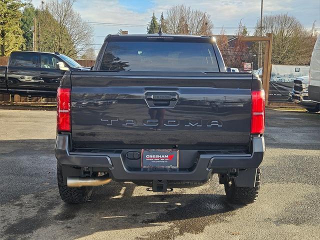 used 2024 Toyota Tacoma car, priced at $49,993