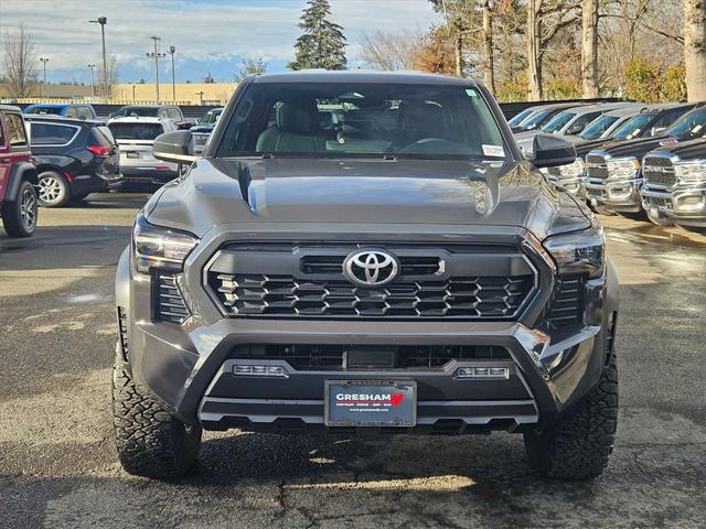 used 2024 Toyota Tacoma car, priced at $49,993