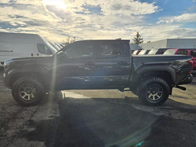 used 2024 Toyota Tacoma car, priced at $49,993