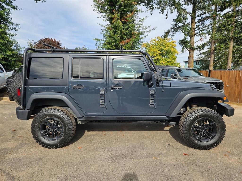 used 2017 Jeep Wrangler Unlimited car, priced at $16,893