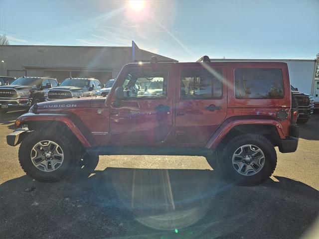 used 2013 Jeep Wrangler Unlimited car, priced at $17,450