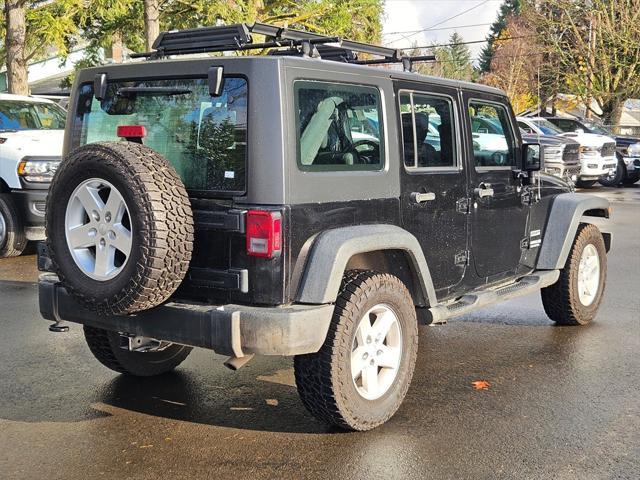 used 2016 Jeep Wrangler Unlimited car, priced at $20,990