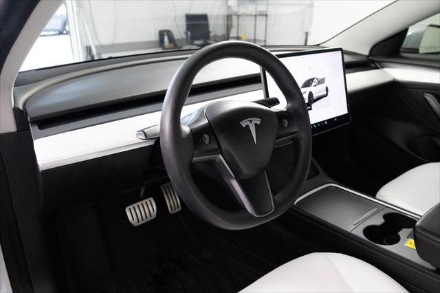 used 2022 Tesla Model 3 car, priced at $28,148