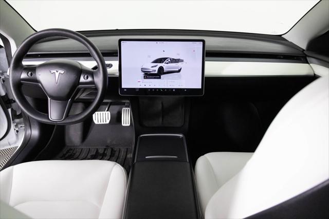 used 2022 Tesla Model 3 car, priced at $28,148