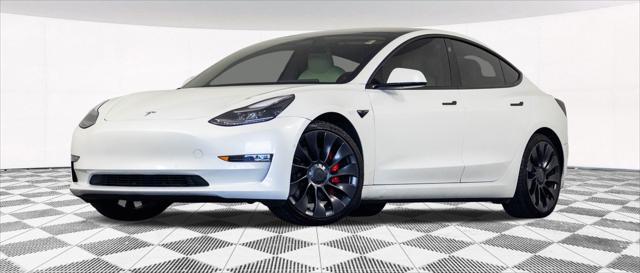 used 2022 Tesla Model 3 car, priced at $28,148