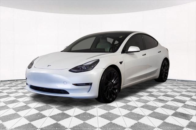 used 2022 Tesla Model 3 car, priced at $28,148
