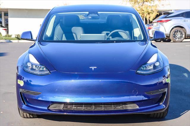 used 2023 Tesla Model 3 car, priced at $28,311